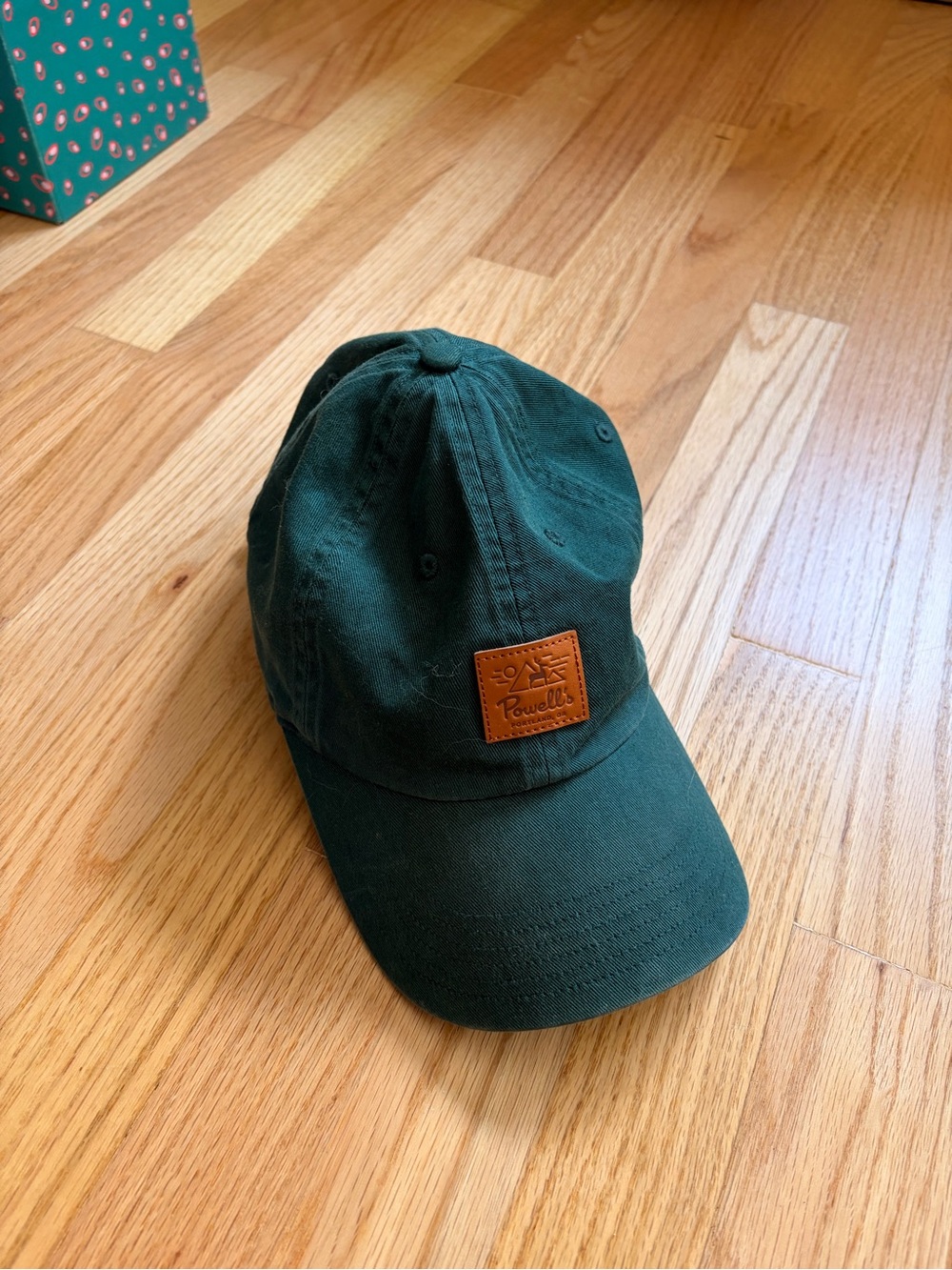 Dark Green Cotton Baseball Cap for Powell’s bookstore